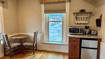 Fridge, microwave, coffee/tea maker, dining tables