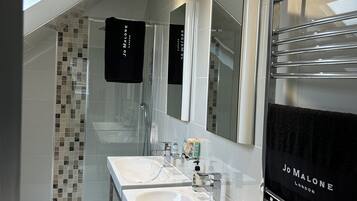 Hair dryer, towels, soap, shampoo