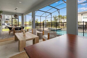 Outdoor dining - Luxury 9BR Solara Home, Themed Fun & Pool (Kissimmee)