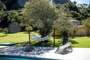 Terrace/patio - Chácara Wermelinger: A beautiful country house in the center of Duas Barras with a leisure area. (Duas Barras)