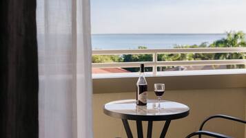 Suite, 1 King Bed, Balcony, Ocean View | Premium bedding, pillowtop beds, minibar, in-room safe