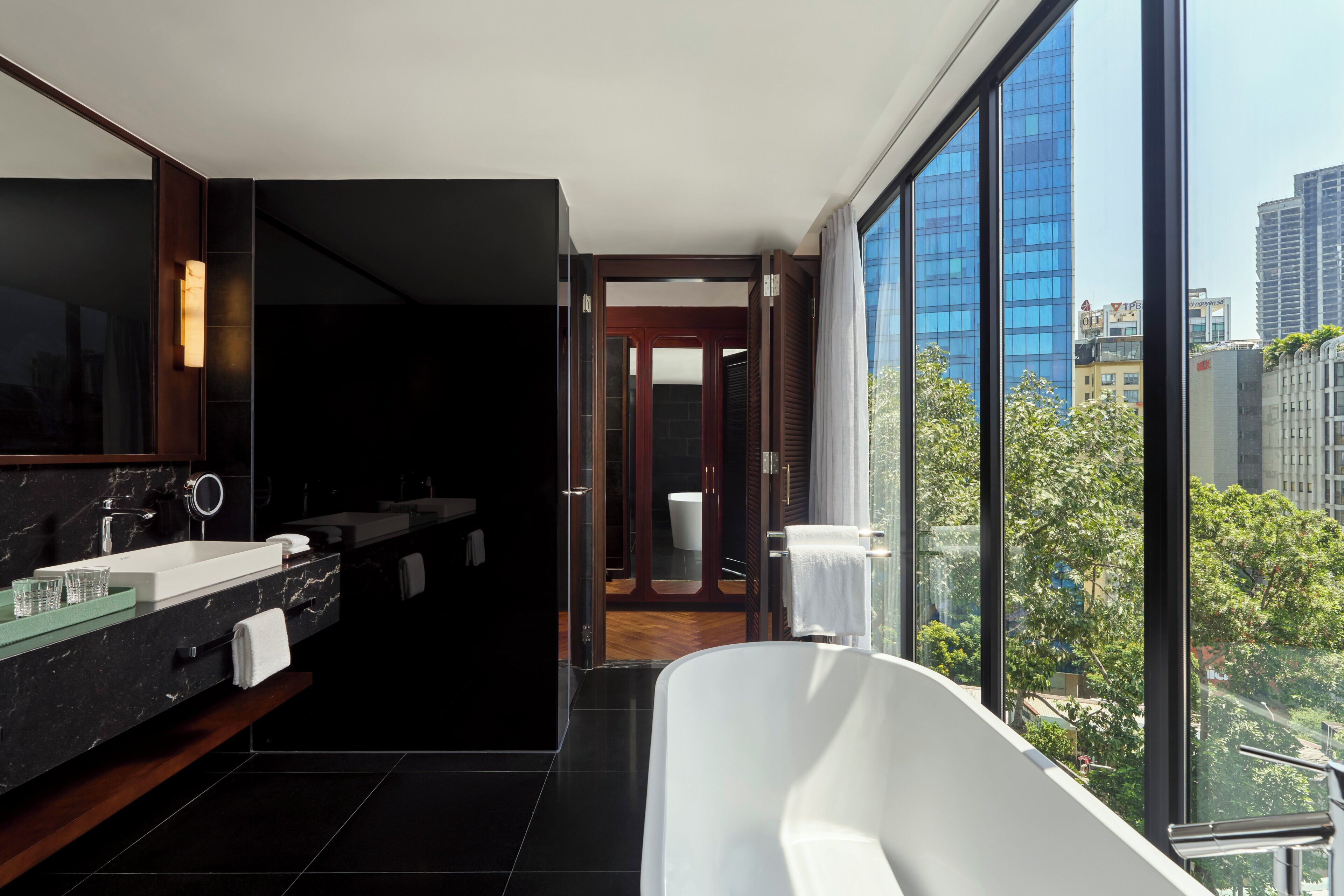 Suite, 1 King Bed | Bathroom | Free toiletries, hair dryer, bathrobes, slippers
