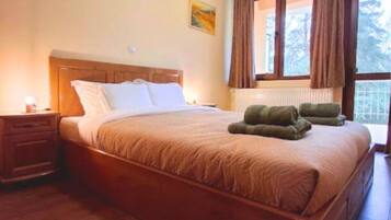 Een strijkplank/strijkijzer, wifi, beddengoed