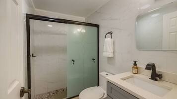 Hair dryer, towels, soap, toilet paper