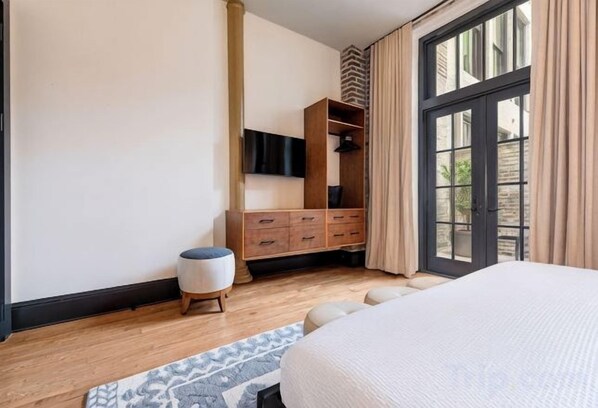 Unclassified image, 1 of 10, button - 2BR Beautiful Space + Private Bedroom Patio The Mayfair (New Orleans)