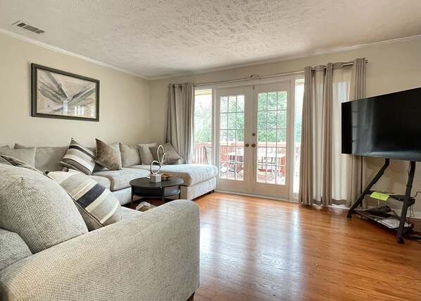 Smart TV, fireplace, books, printers