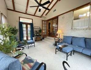 Smart TV, fireplace, books, printers