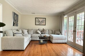 Smart TV, fireplace, books, printers
