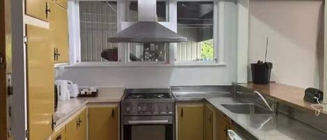 Fridge, microwave, toaster, cookware/dishes/utensils