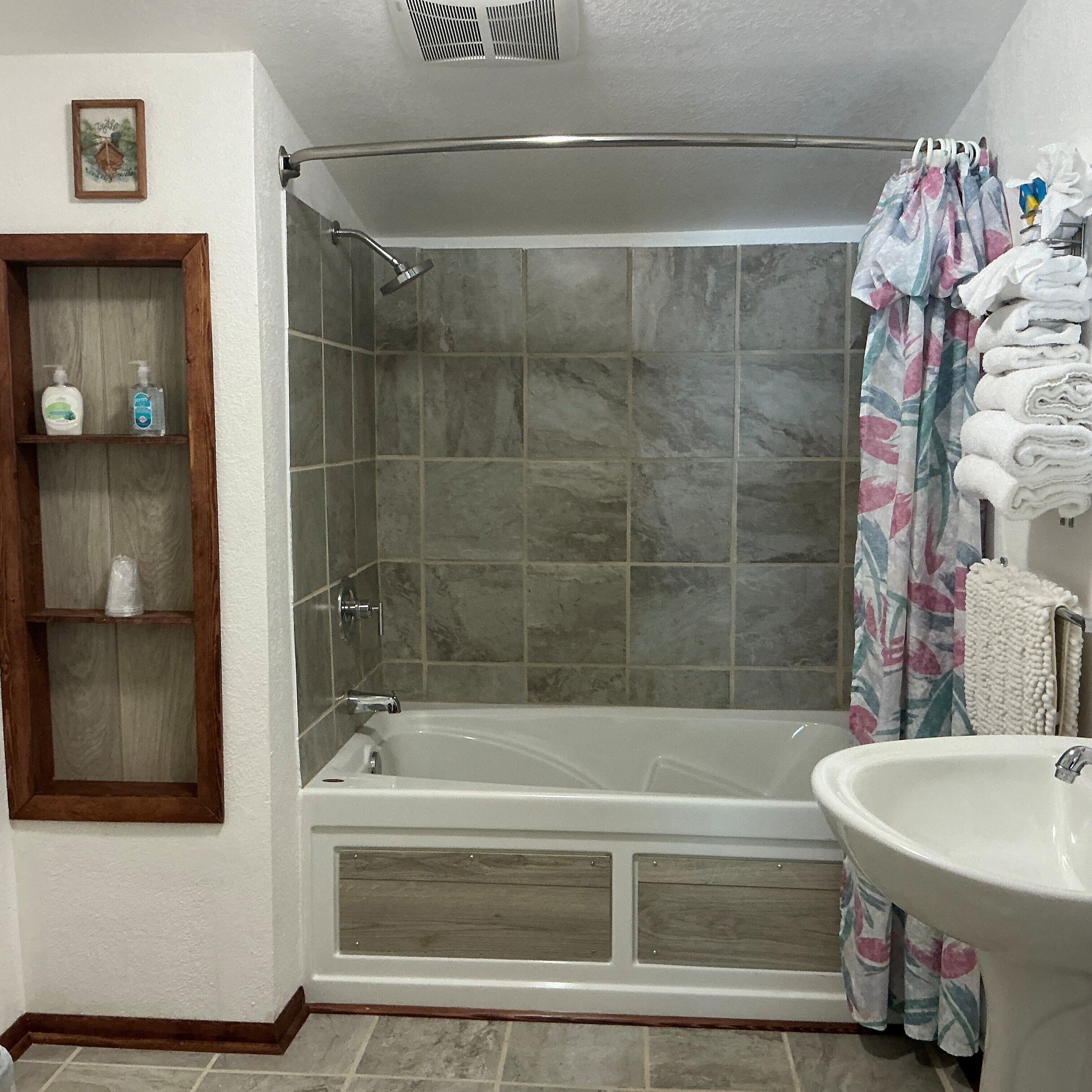 Deluxe Room, 2 Queen Beds, Non Smoking | Bathroom | Shower, hair dryer, towels, soap