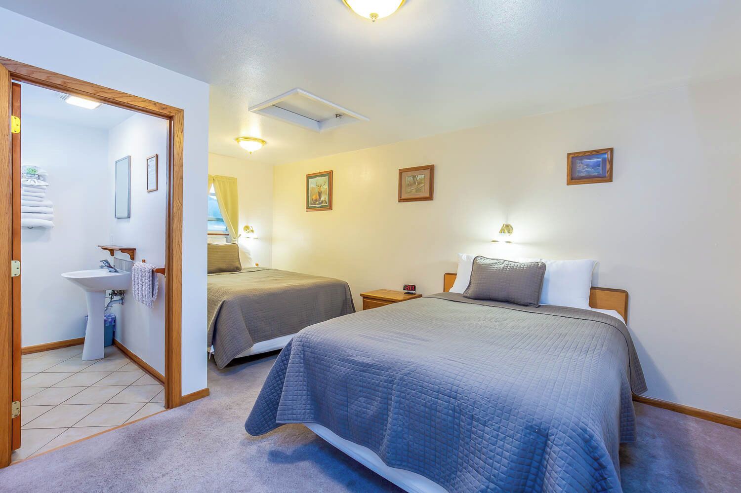 Comfort Room, 2 Queen Beds, Non Smoking | Free WiFi