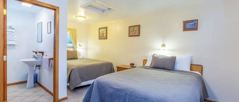 Comfort Room, 2 Queen Beds, Non Smoking | Free WiFi