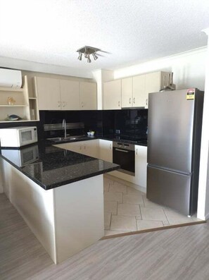 Private kitchen - Sails Resort on Golden Beach Unit 25 (Sunshine Coast)