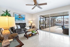 Smart TV - Beautiful Riverfront House — Screened Lanai, Pool, Private Dock & Pet‑Friendly! 🌊 (Cocoa Beach)