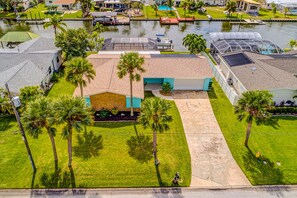 Exterior - Beautiful Riverfront House — Screened Lanai, Pool, Private Dock & Pet‑Friendly!  🌊 (Cocoa Beach)