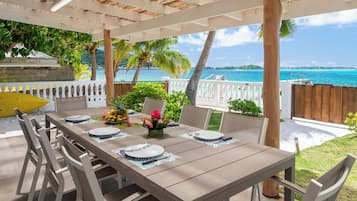 Nhà, sân hiên, quang cảnh bãi biển | Hiên