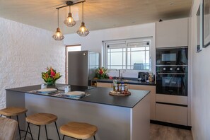 Maison, patio, vue plage | Cuisine privée