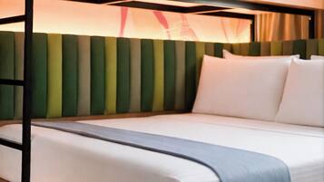 A bunk bed with a lower level bed and a top bunk.