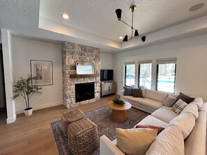 Smart TV, fireplace, table football - Cabin w/Hot Tub & Bunk Room - Steps to the lake! (Valley County)