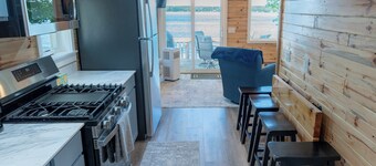 On the lake, Cozy Two bedroom cottage with frontage on Manistee Lake