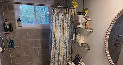Cozy 2 bed/2.5 bath home with beautiful yard in peaceful neighborhood.