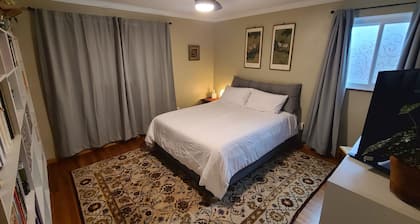 Cozy 2 bed/2.5 bath home with beautiful yard in peaceful neighborhood.