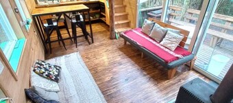 Beautiful cabin in the forest, with river, no neighbors, roofed terrace, parking and wiFi