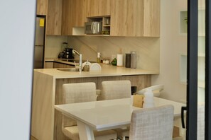 Deluxe Apartment, Balcony, Mountain View | Dining room - Apartments in Cumbaya near Airport (Cumbayá)