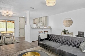 TV, offices - Dolphin House | Modern 2BR w/ Fire Pit & Backyard Retreat Office (Austin)