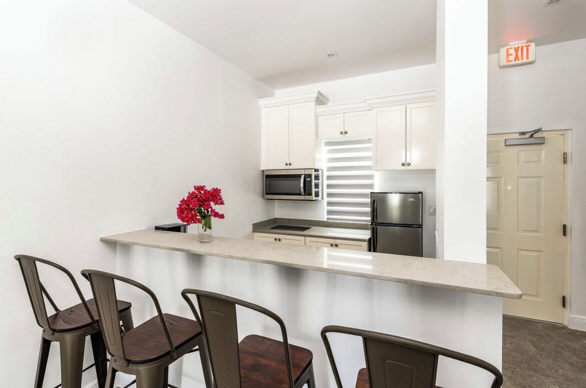 Fridge, microwave, stovetop, coffee/tea maker