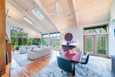 Custom 3-bedroom contemporary home on 10 rural acres yet near all amenities