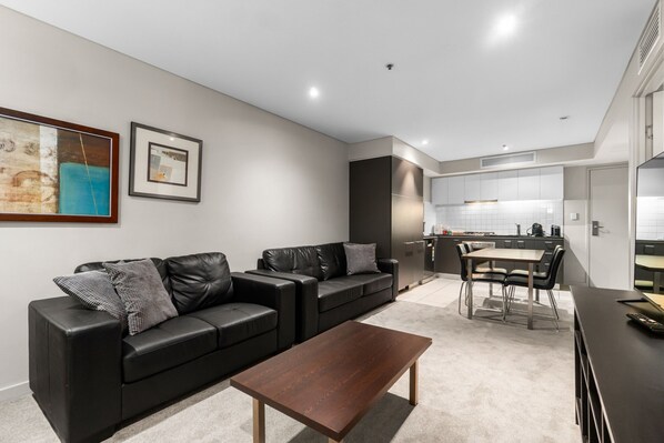 Living room - 2-bed City Retreat With Gym and Pool Access (Adelaide)