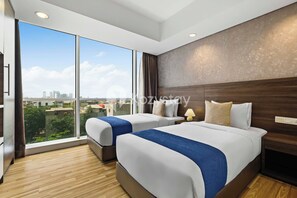 Appartamento, 2 camere da letto, vista città | Una scrivania, postazione laptop, ferro/asse da stiro, Wi-Fi gratuito