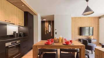 Appartement | Privékeuken | Een kinderstoel