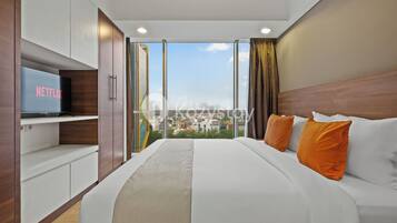 Apartment, 2 Bedrooms, City View | Desk, laptop workspace, iron/ironing board, free WiFi