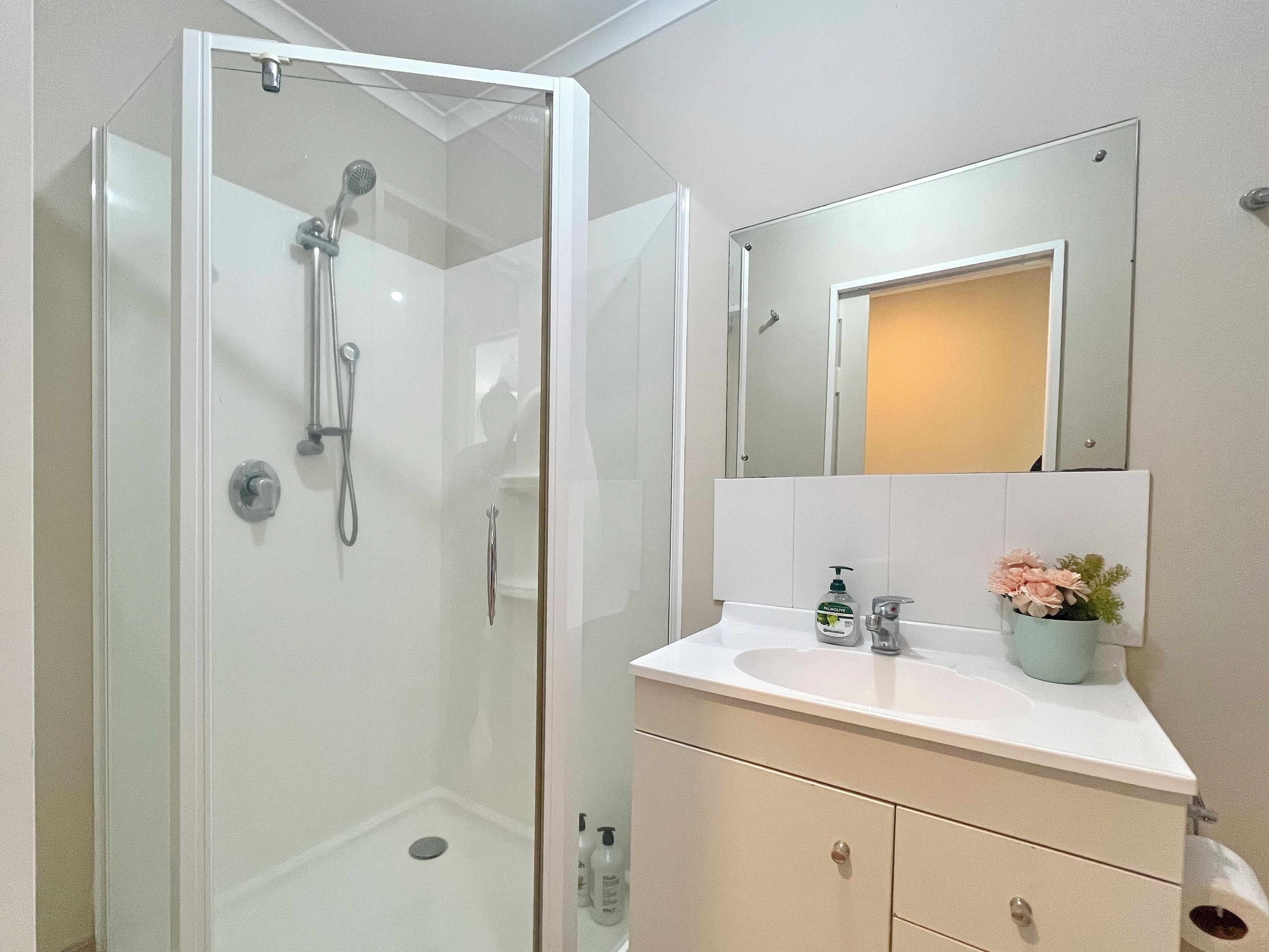 Shower, hair dryer, towels, soap