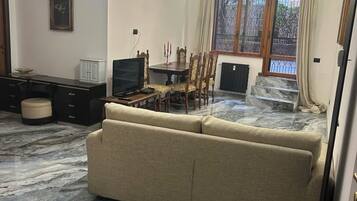 Deluxe-Apartment, Gartenblick | Wohnbereich