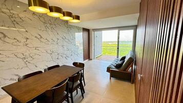 Luxury Apartment, Balcony, Lagoon View | Dining room