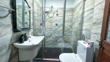 Shower, free toiletries, hair dryer, towels