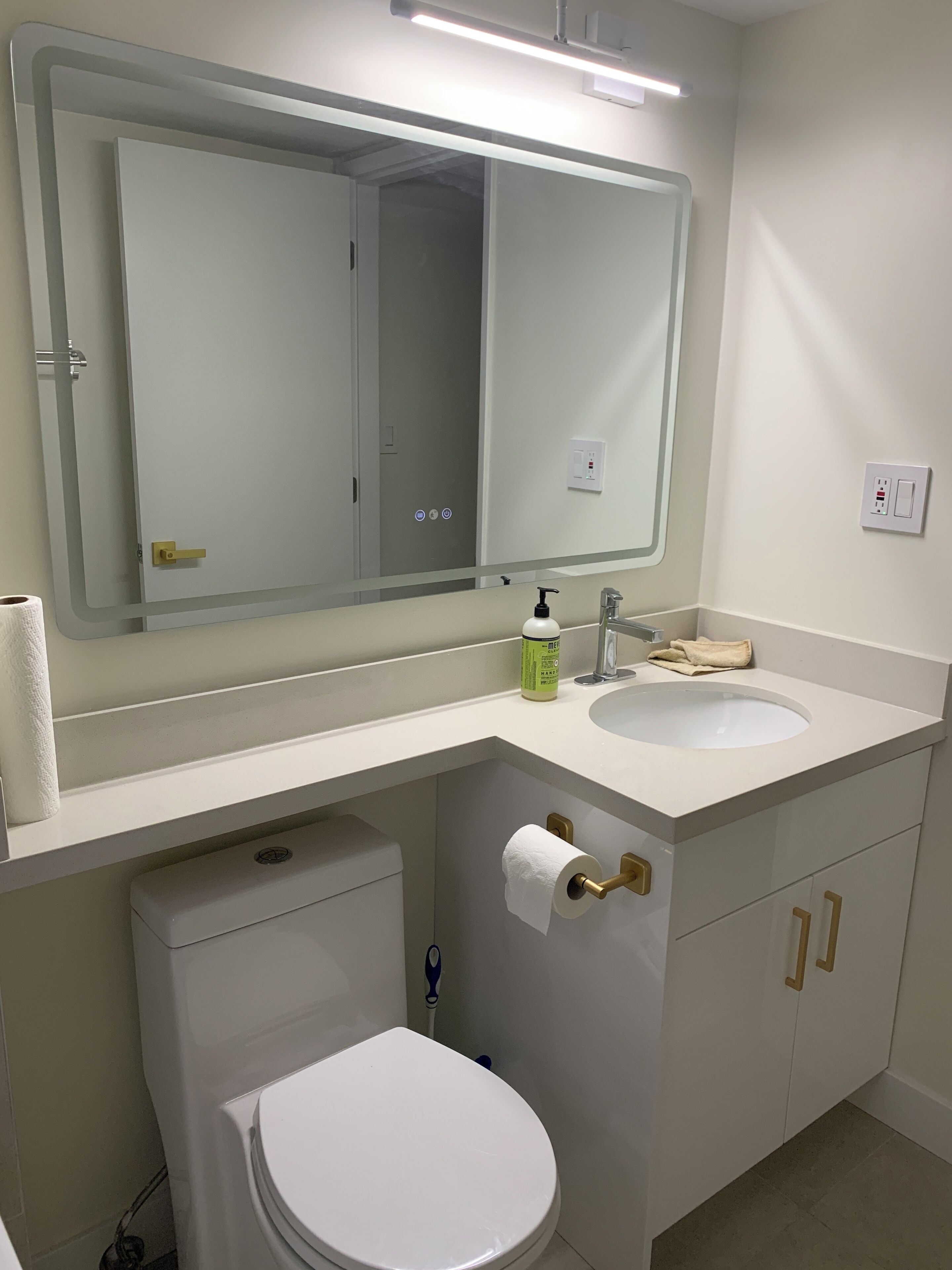 Hair dryer, towels, soap, toilet paper