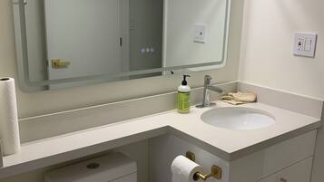 Hair dryer, towels, soap, toilet paper