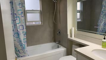 Hair dryer, towels, soap, toilet paper