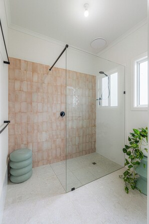 Shower, towels, soap, toilet paper