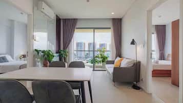 Grand Suite, 1 Bedroom, Club lounge access, Harbour View | Living area | 65-inch Smart TV with cable channels, Netflix, pay films