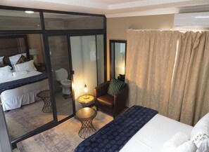 Executive Suite, Garden View | Bathroom - kebo events &self catering apartments (Malotwana)