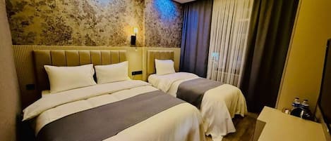 In-room safe, desk, laptop workspace, blackout curtains