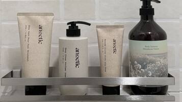 Hair dryer, towels, soap, shampoo