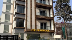 A multi-story hotel with a prominent sign reading "THE PROMINENCE". - The Prominence Hotel Greater Noida (Greater Noida)