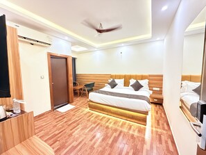 Deluxe Double Room, City View | Desk, laptop workspace, blackout drapes, iron/ironing board