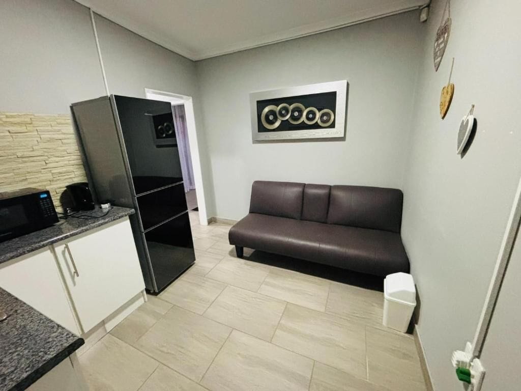 이그제큐티브 더블룸 | 거실 공간 | TV